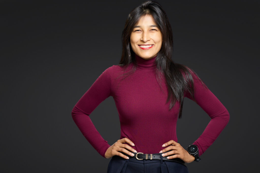 portrait of woman in a photo studio with black background